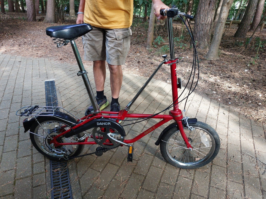 Dahon fold up bikes. Paintwork in great condition. One red, one blue