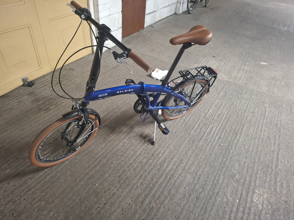 Raleigh Stowaway Folding Bike 6 Speed Metallic Blue.Never Used Great Condition