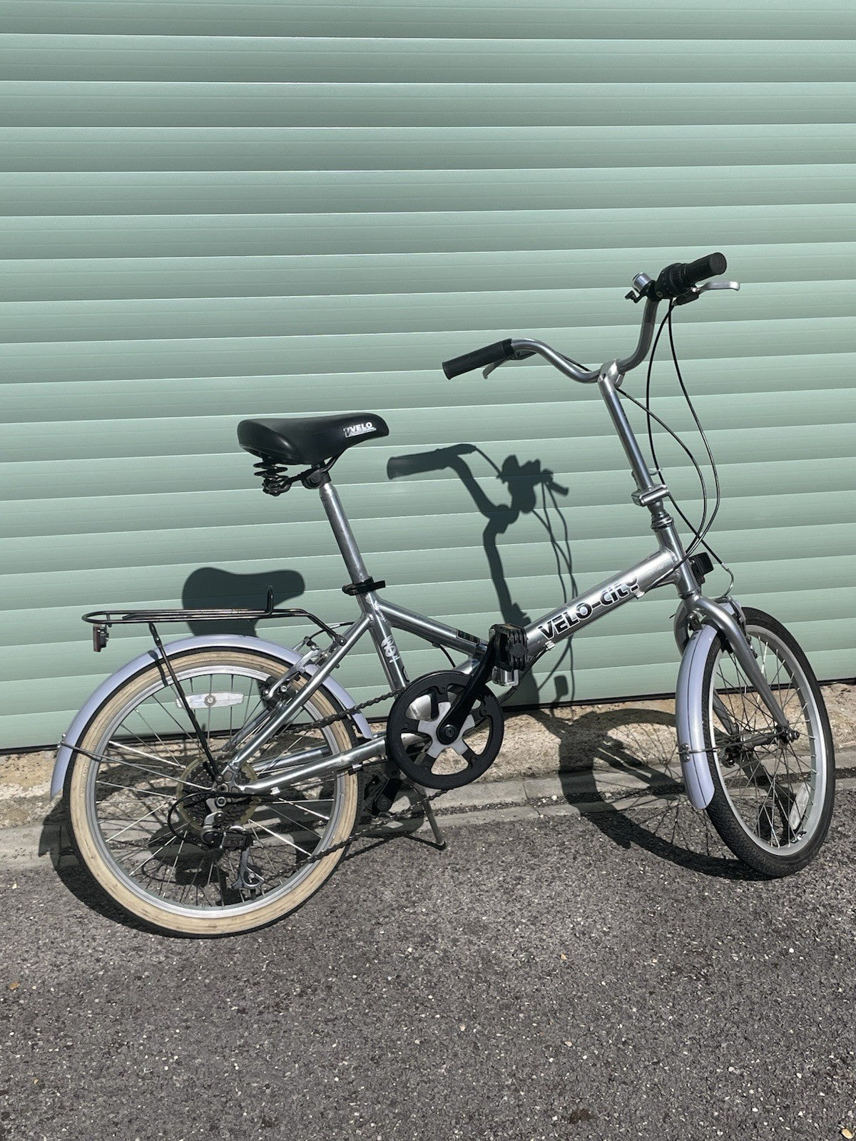 A Pair Of Velo-city 5 Speed Folding Bikes In Good Condition With Bags