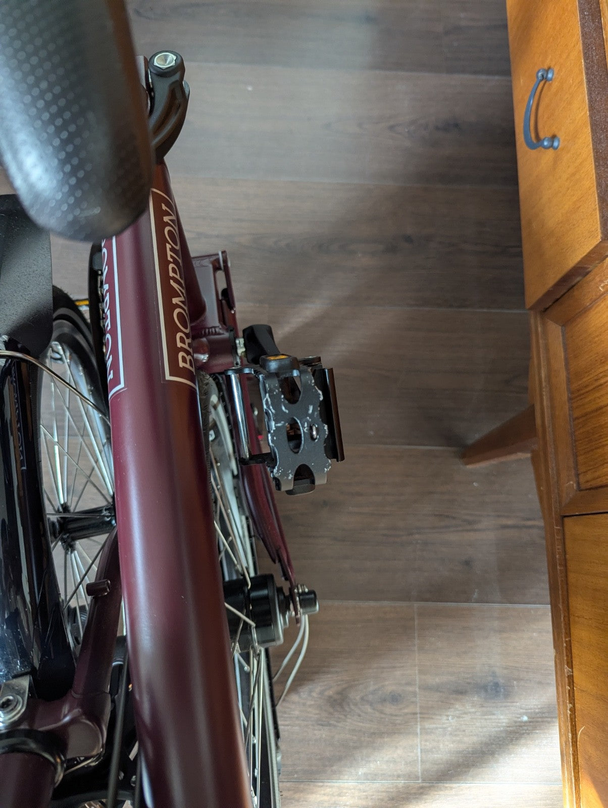 Brompton bike C-line 12-speed 2026 mid bar in Burgundy colour
