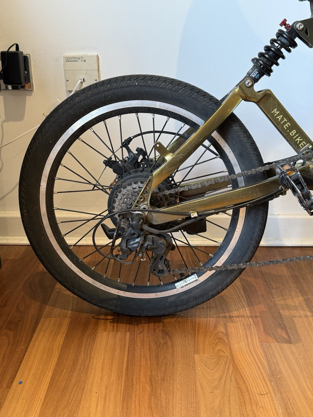 Olive Gold 250W MATE City Bike with 60mile Range, Discs & Full Suspension