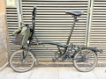 Brompton M6R c-type folding bike - 6 speed, black w. rear rack and front bag