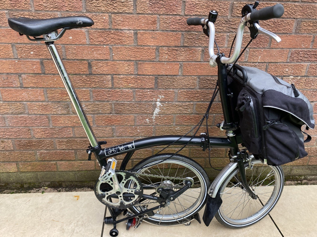 Brompton Folding Bike 3-Speed comes with front bag.