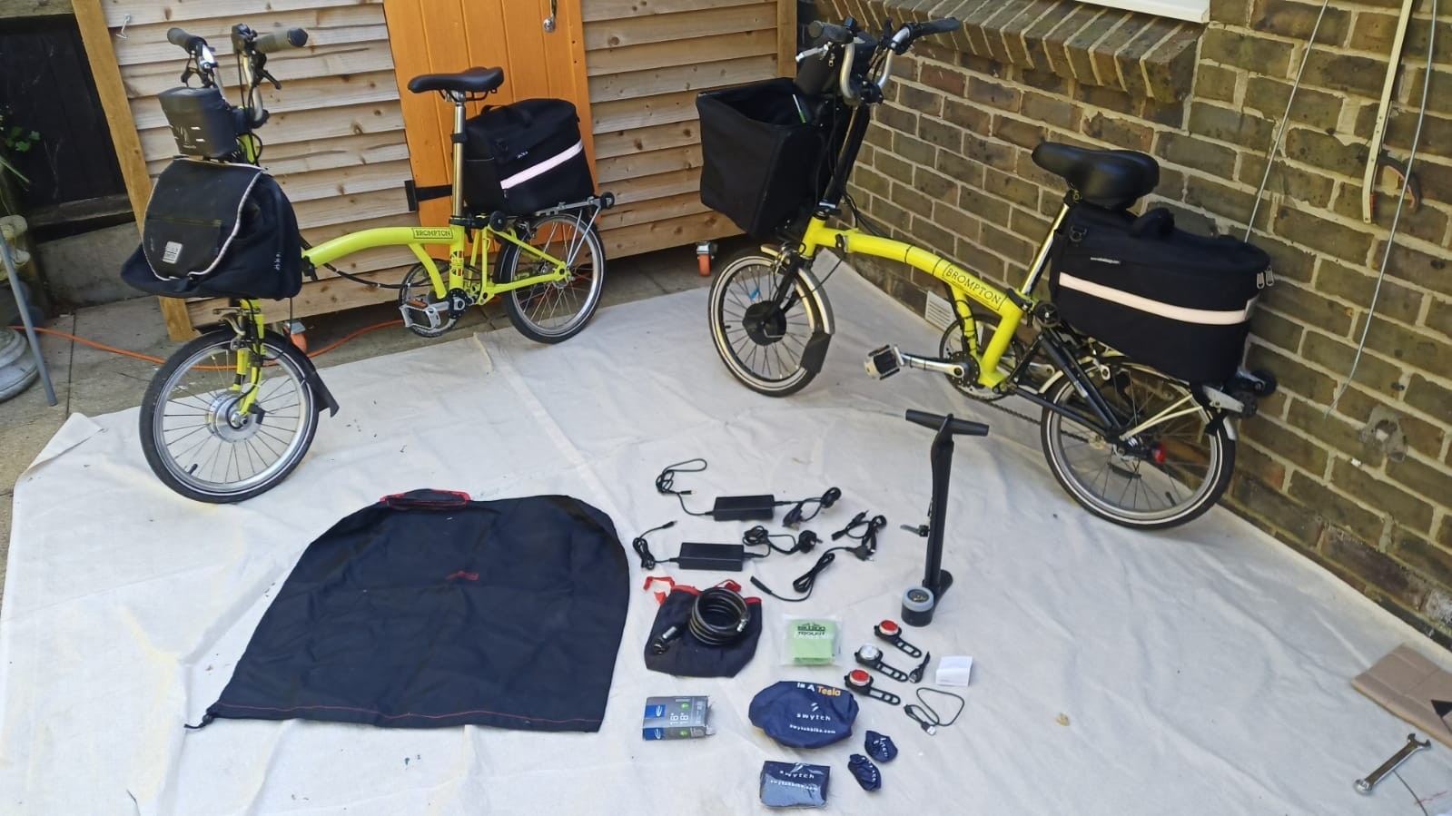 A Pair Of Canary Yellow Bromton Bikes