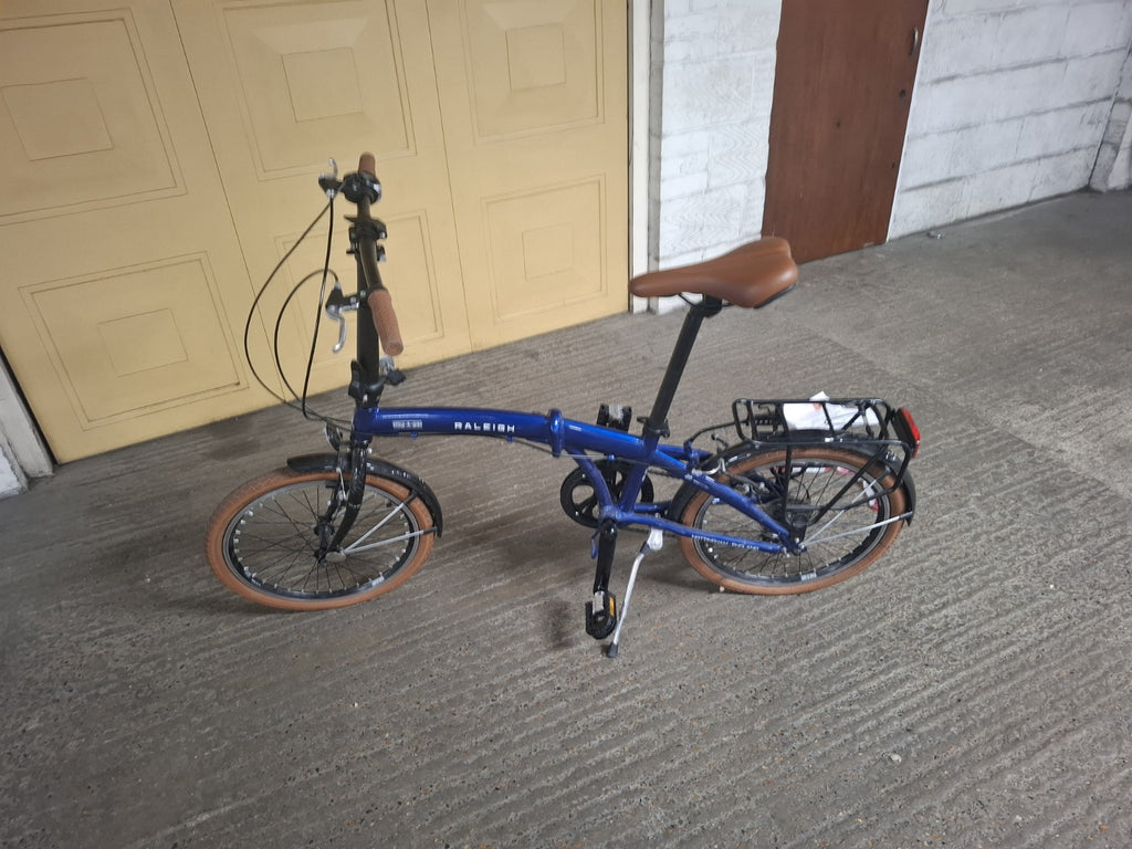 Raleigh Stowaway Folding Bike 6 Speed Metallic Blue.Never Used Great Condition