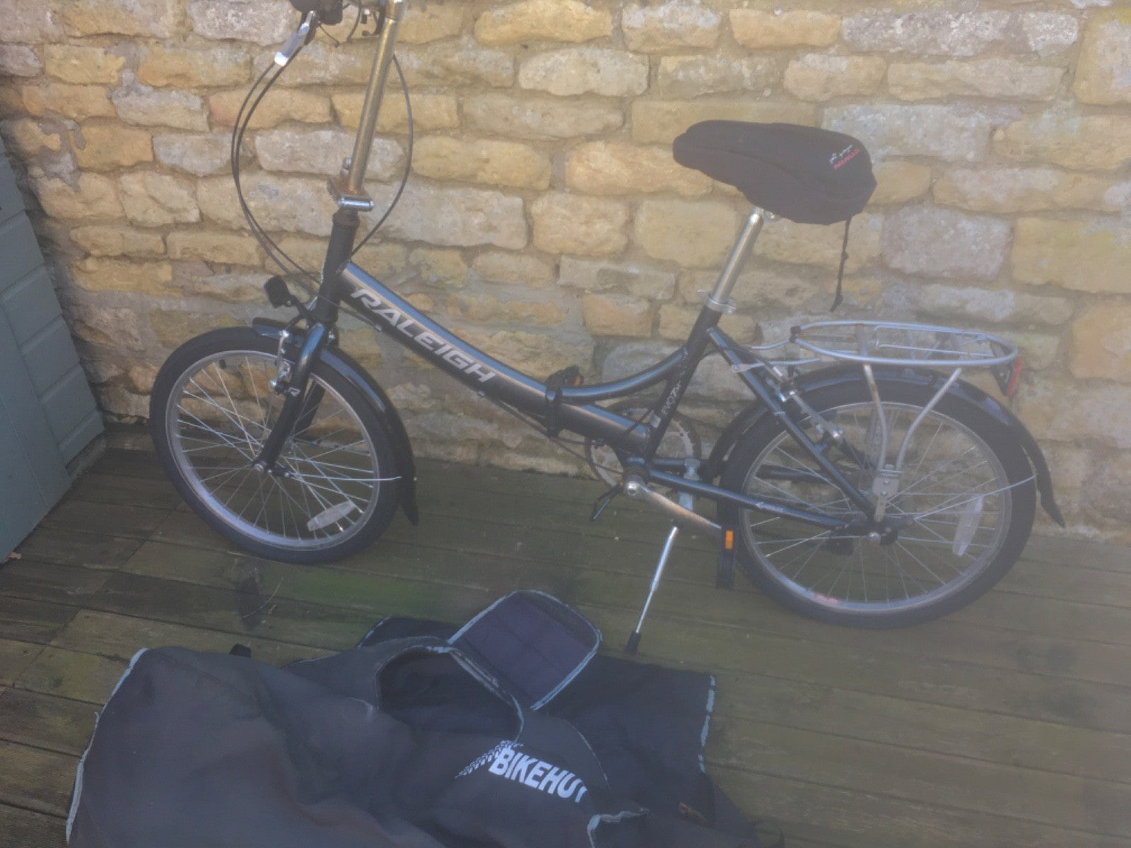 Raleigh Folding Bike plus cover.  Good condition