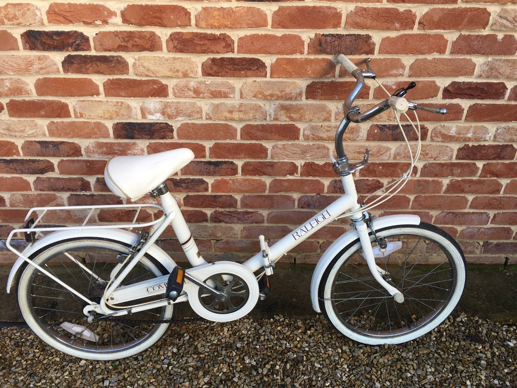 Raleigh Compact white foldable unisex bicycle used,