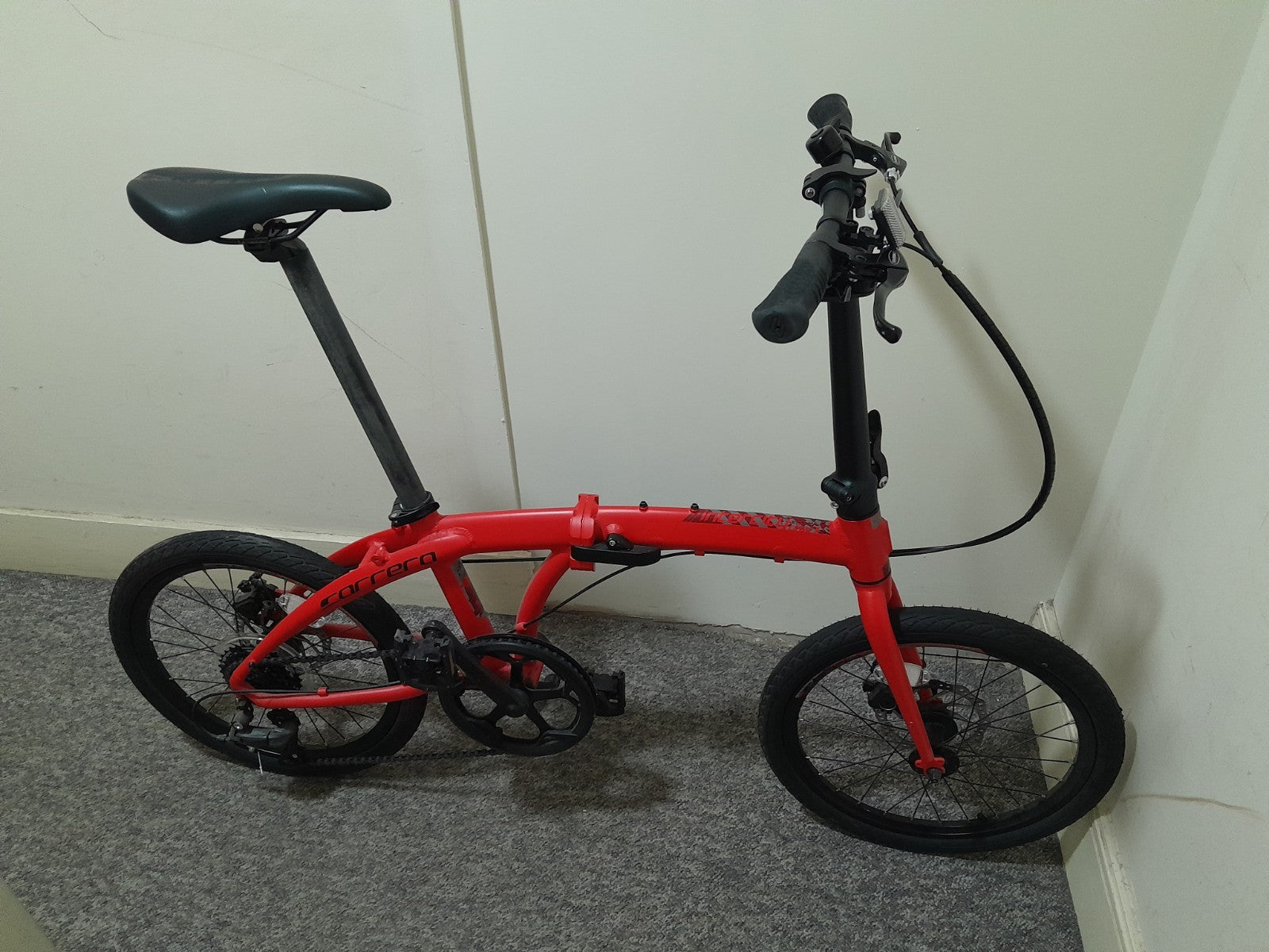 Carrera Intercity Folding Bicycle 8-Speed, Colours Orange Black