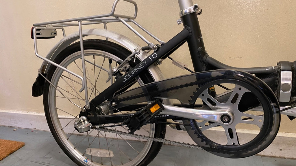 Pinnacle Journey 1.0 folding bike in matte black. Shimano Nexus 3-speed.