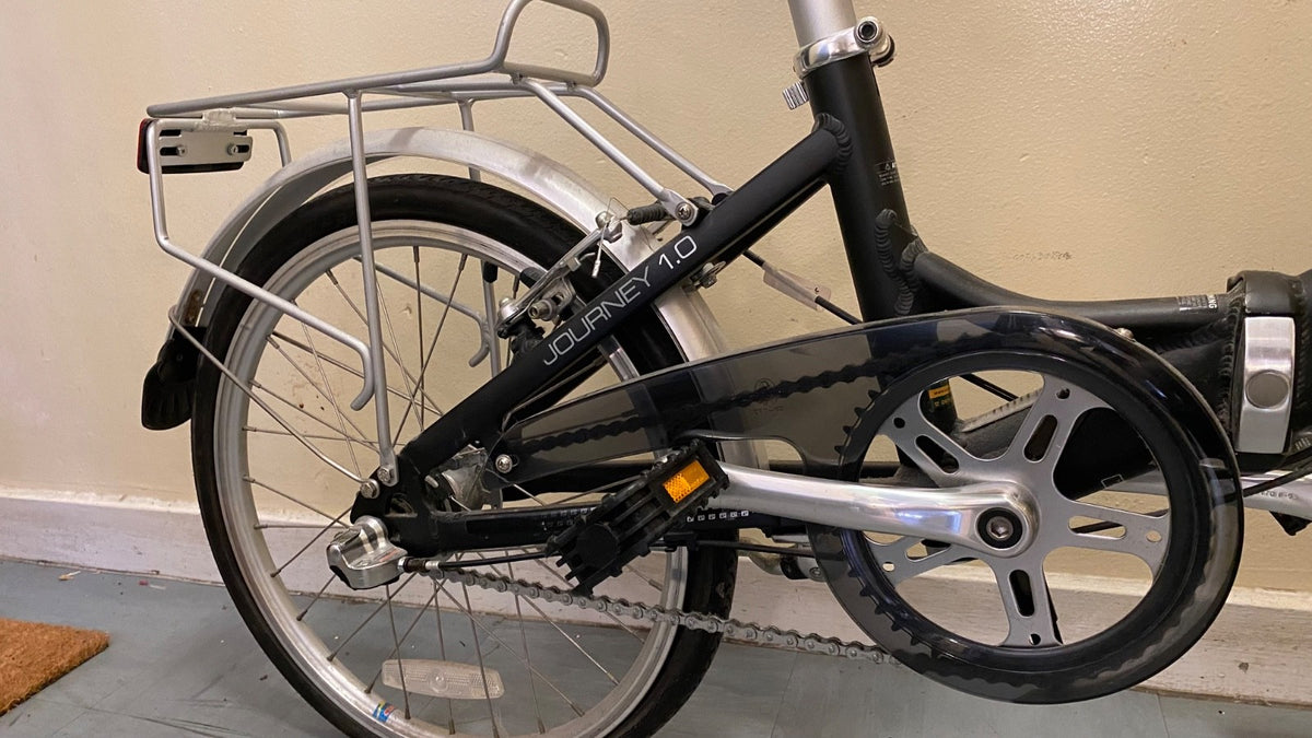 Pinnacle Journey 1.0 folding bike in matte black. Shimano Nexus 3-speed.