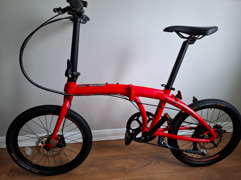 Carrera Intercity Disc 8-Speed Folding Bike With Accessories and more