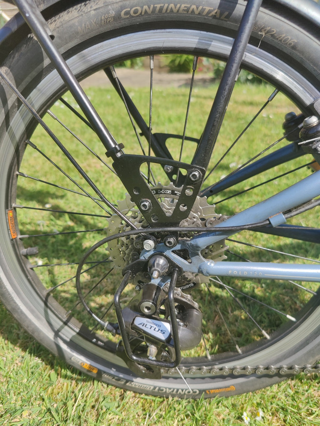 Ultra Upgraded Tilt 120 Folding Bike 7 speeds, Rear Rack + Waterproof Bags