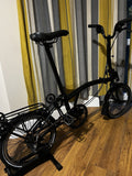 Brompton 6-Speed Black edition with panier rack and roller wheels