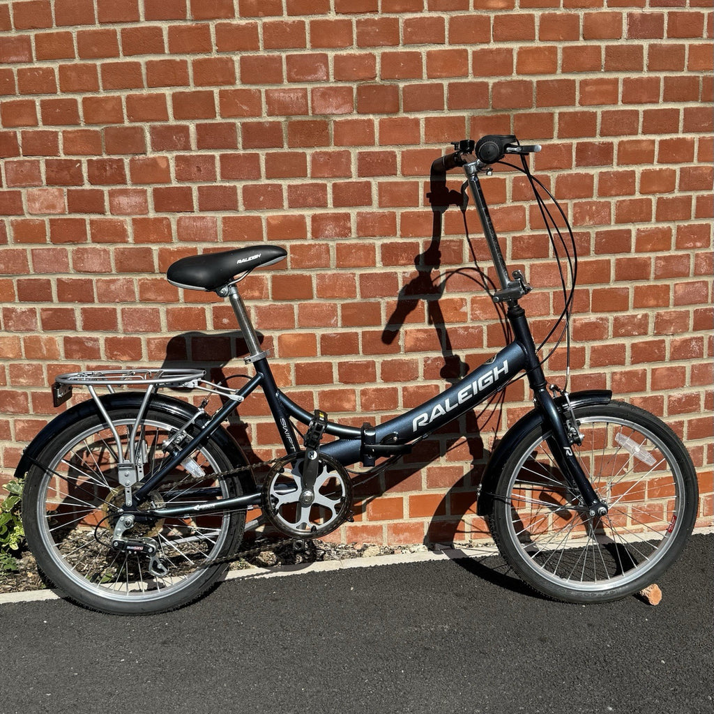 Raleigh Swift Aluminium Folding Bike Adults Compact 20” Wheels with Rack, Gears
