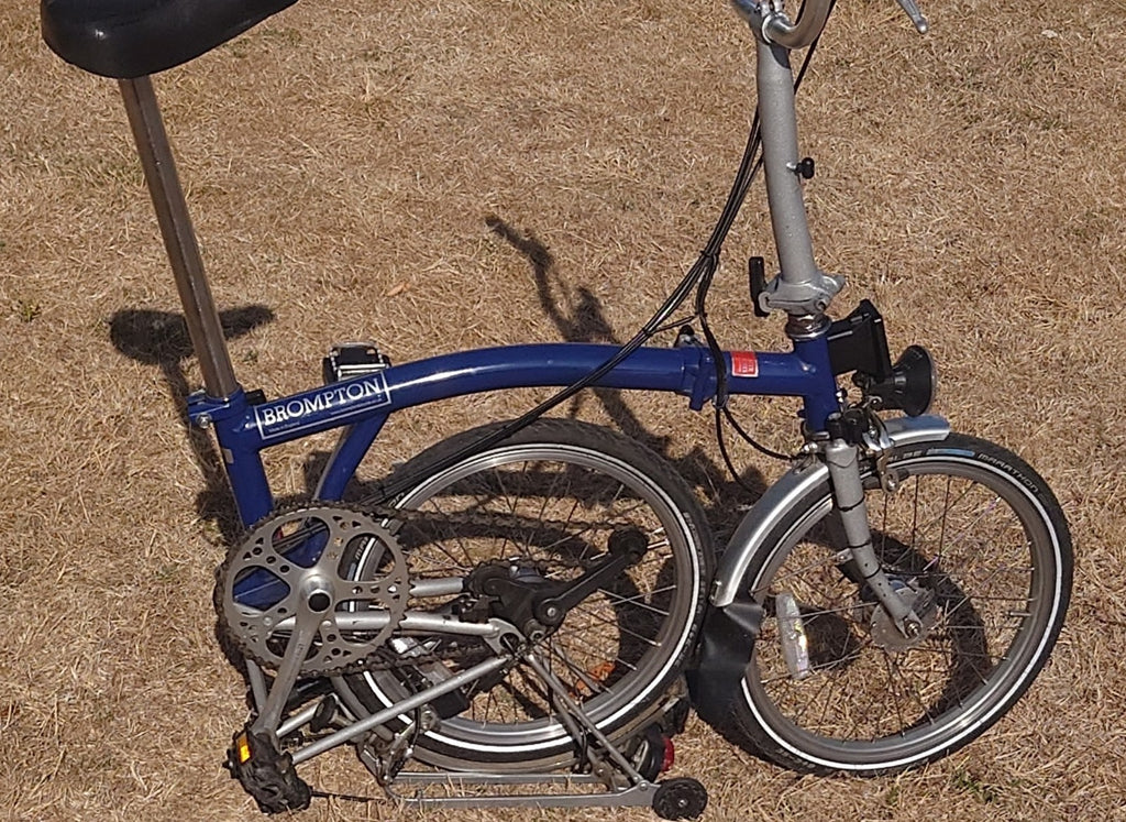Brompton M6R folding bike good condition front rear rack bag led lights 6 speed