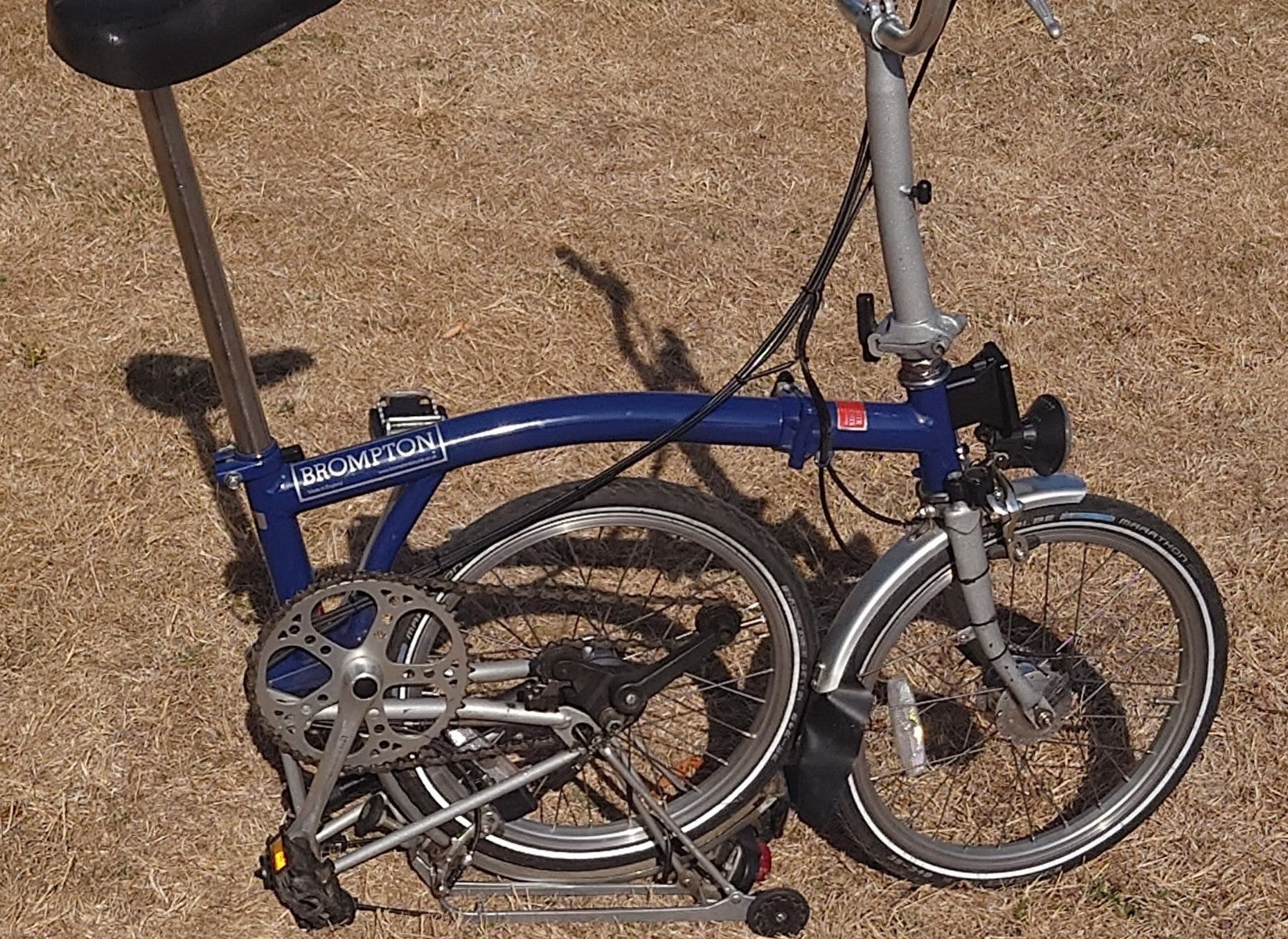 Brompton M6R folding bike good condition front rear rack bag led lights 6 speed