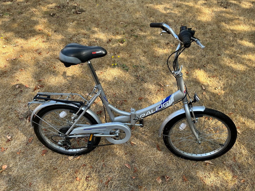 Raleigh FOLD 06 20" Folding Bike 6 Speed Shimano Carry Bag Lock Rear Rack
