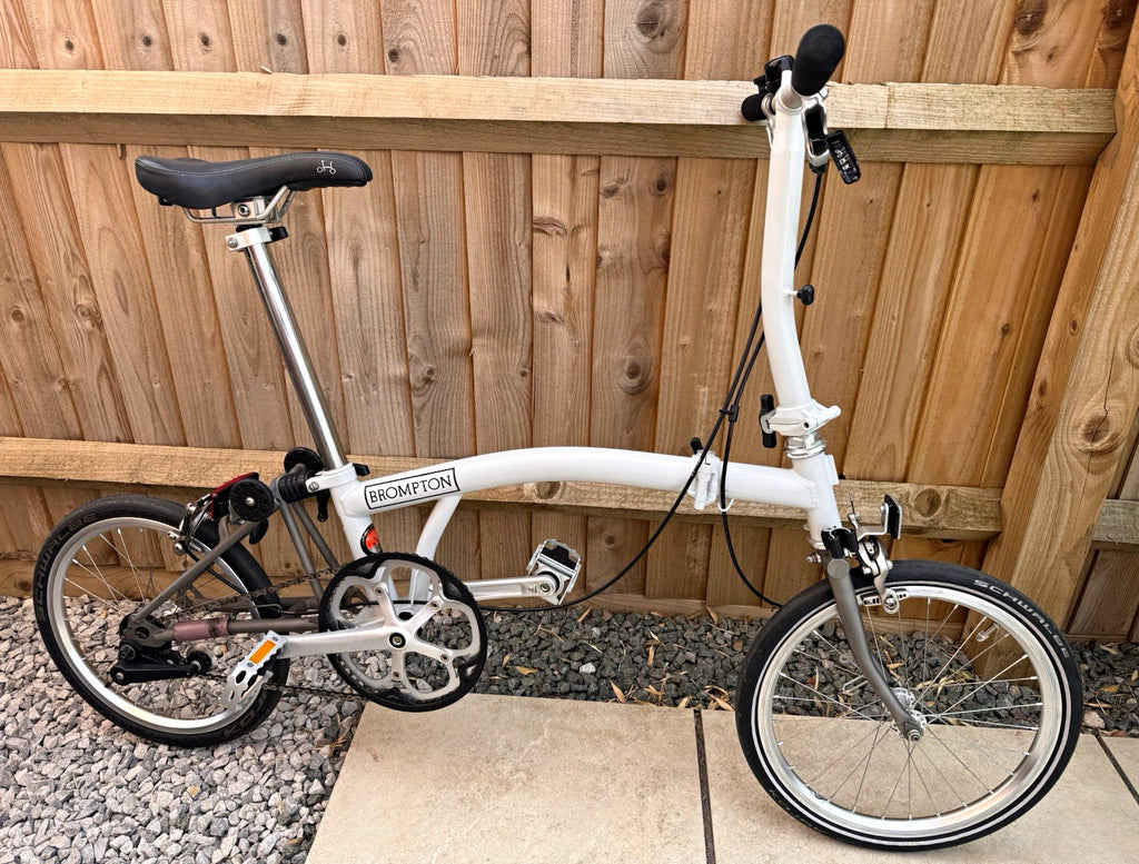 Brompton Titanium / Steel Single Speed 8.3kg with ancillaries