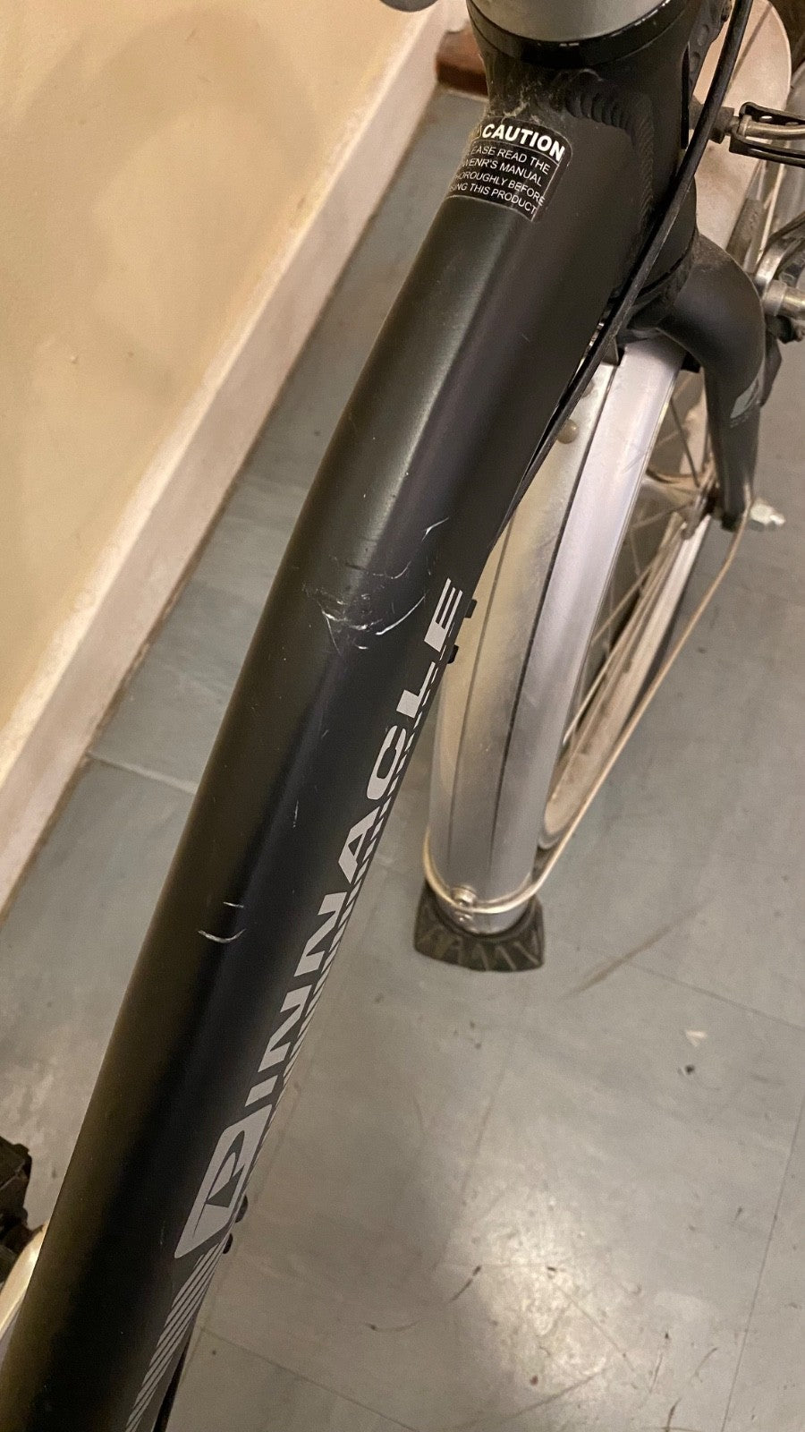 Pinnacle Journey 1.0 folding bike in matte black. Shimano Nexus 3-speed.