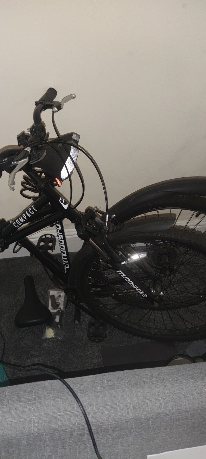 Muddy Fox Compact folding mountain bike.