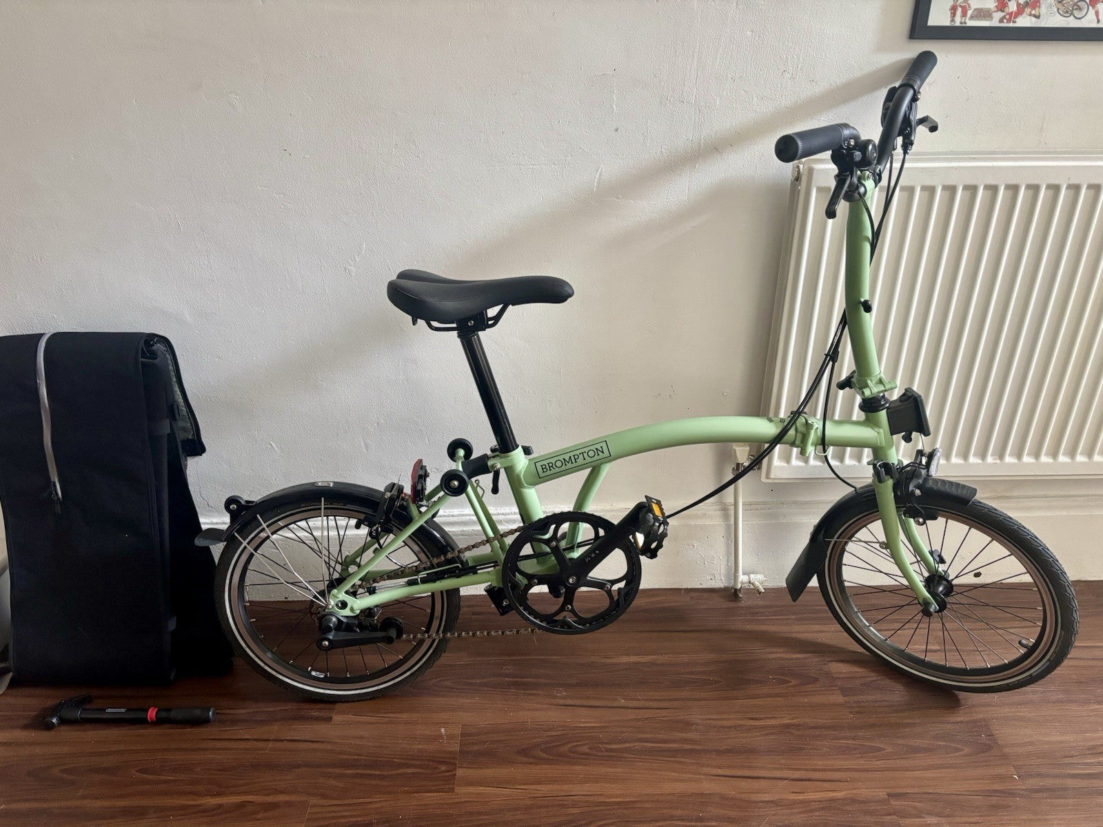 Brompton C Line 2 Speed Matcha Green 2023 with brompton bag and pump