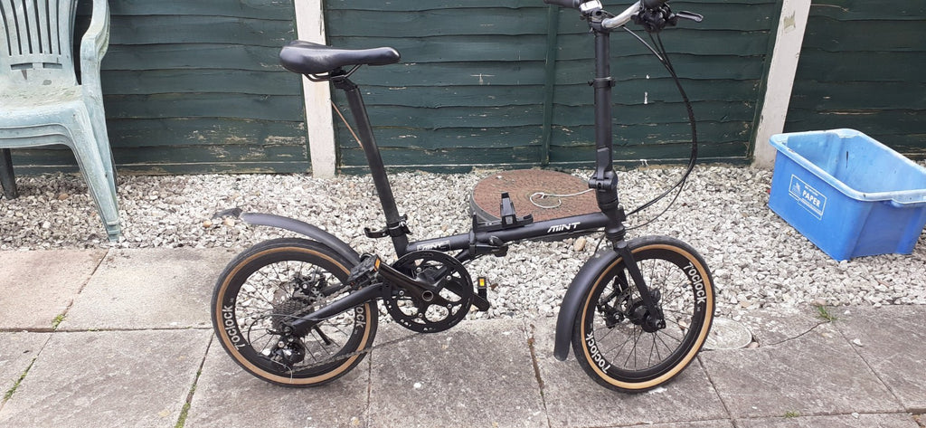 MINT bike 9 Speed Folding Bike with 16 Inch 349mm Wheels with disc brakes.