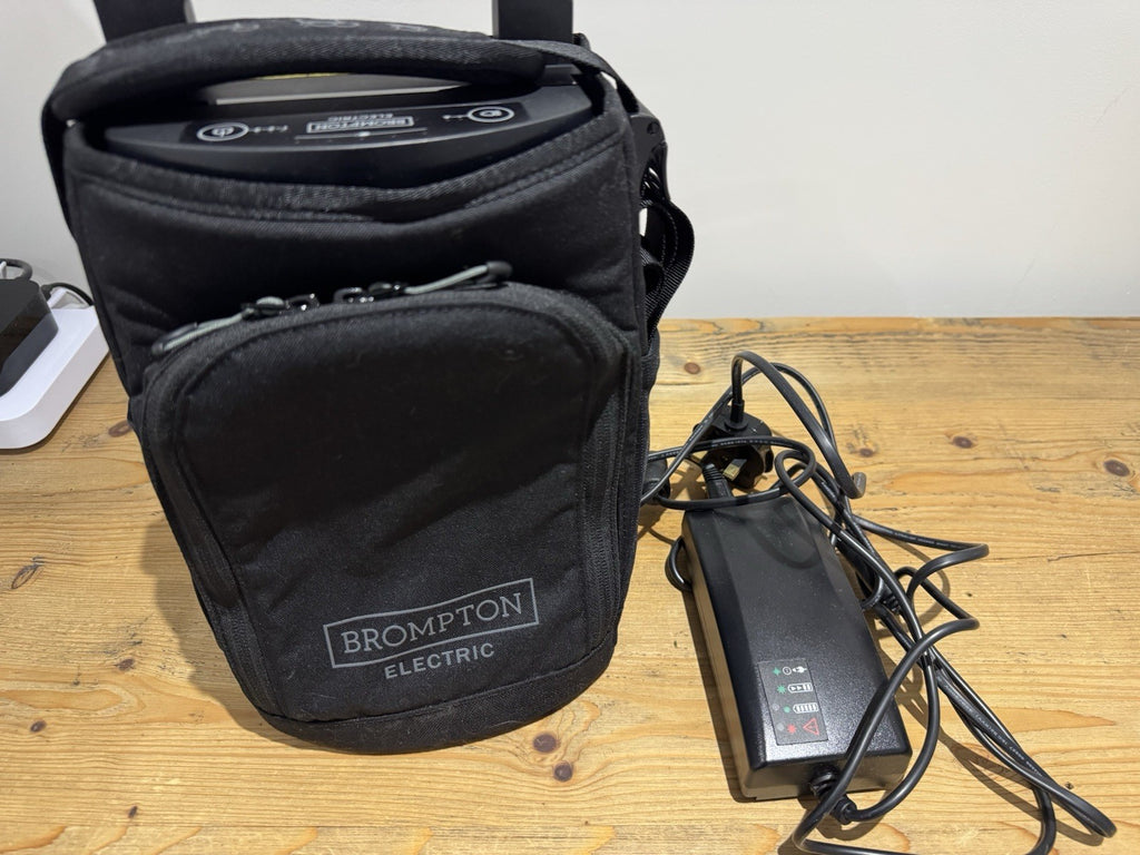 Brompton Electric P line 4 Speed Emerald Lacquer, 50 Miles, Quad Lock, City bag