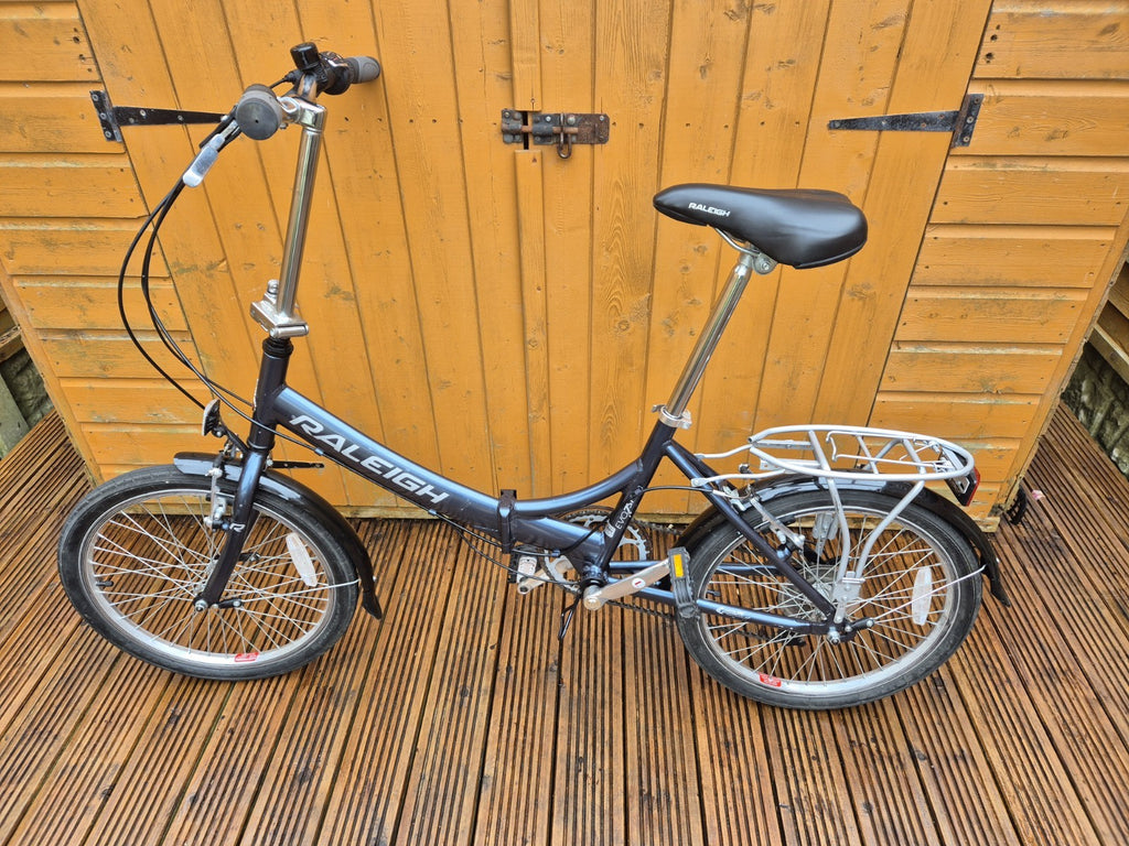 Raleigh Evo 7sp Folding Bike Aluminum Frame, 20" Wheels, 7-Speed with Revo Grip