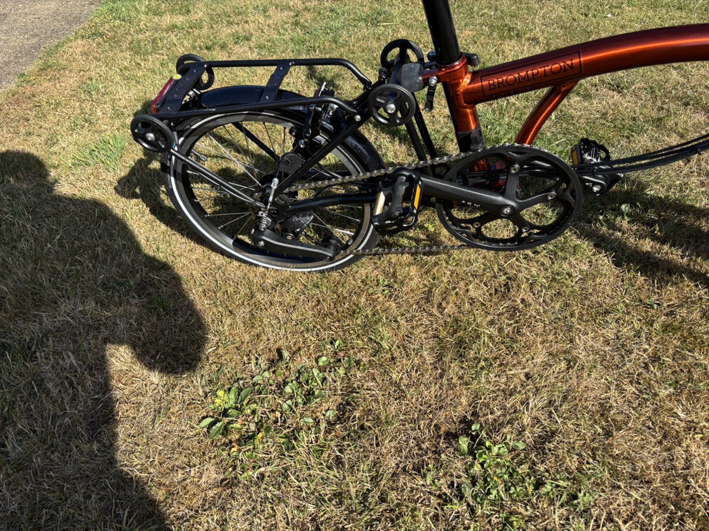 Brompton Electric C Line Explore Mid + Rack - 12 Spd - flame lacquer