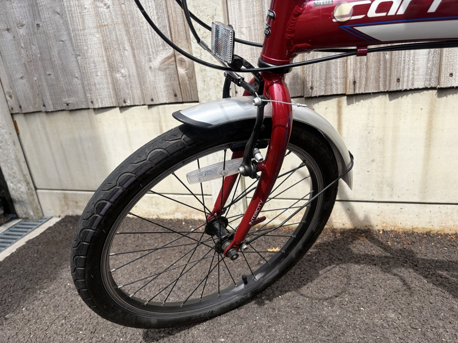 Carerra Intercity Folding Bike In Red.