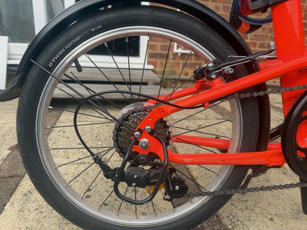 B'TWIN 500 20in Folding Bike 7-Speed Grip Shift Aluminium V-Brakes Red