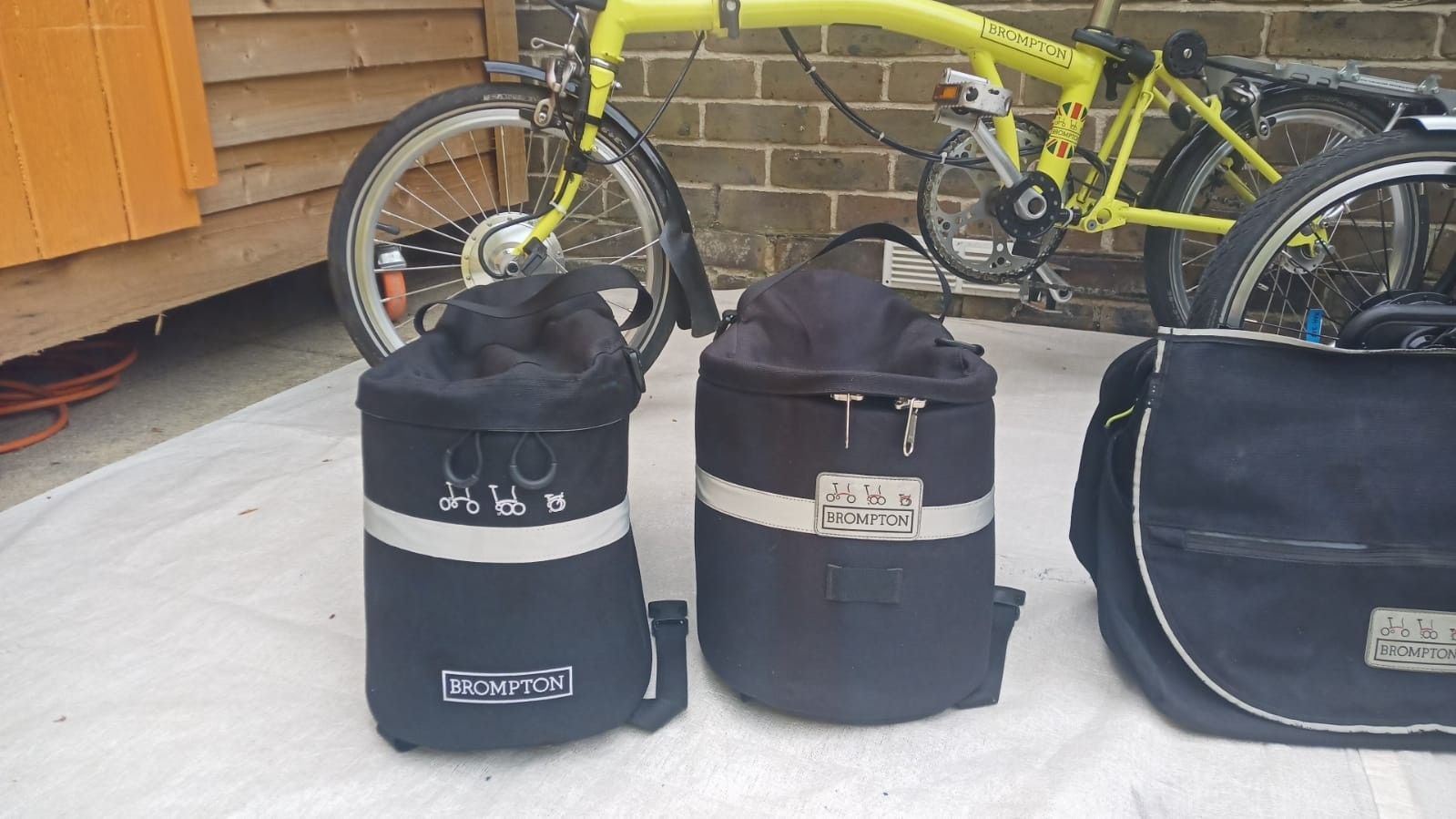 A Pair of Yellow Bromton Bikes In Excellent Condition with Conversion Kit