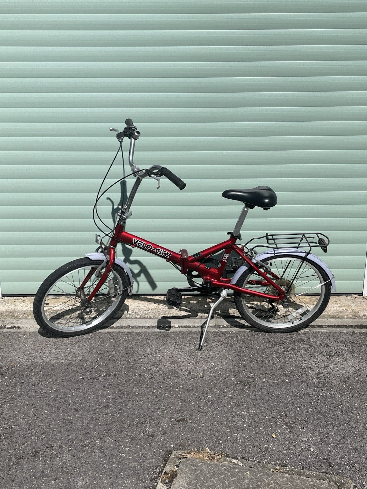 A Pair Of Velo-city 5 Speed Folding Bikes In Good Condition With Bags