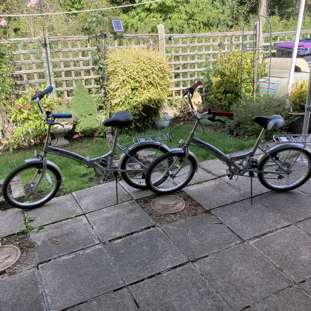 TWO Stowabikes 20in Folding Bikes Silver Rear Rack Mudguards Grip Shifter