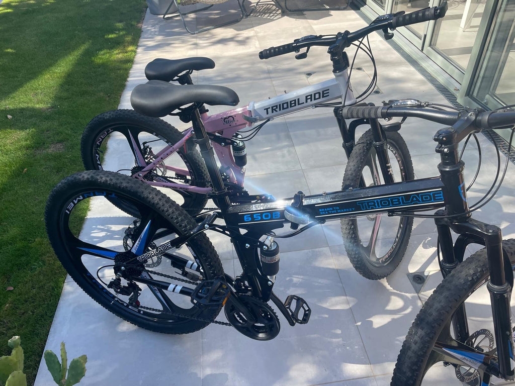 male and female folding mountain bikes - dual susp, disc brakes, multispeed