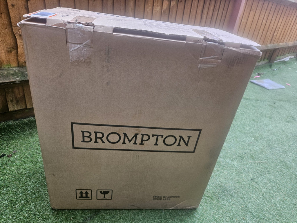 Brompton Electric C Line - 4 Speed - Mid Handlebar  Black Folding Bike