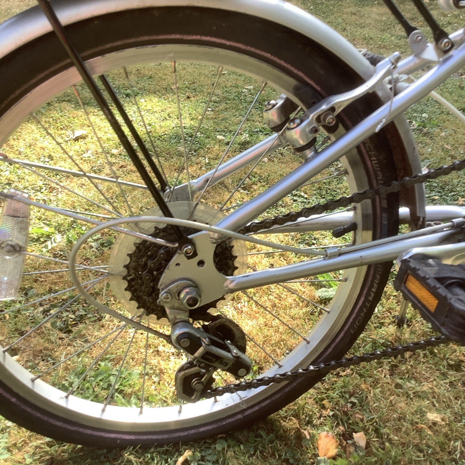 Silver 20 in Folding Bike Derailleur Gears Rim Brakes Flat Bar Kickstand