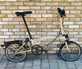 Brompton M6R 6 Speed Folding Bike – Dune Sand – Rear Rack – BikeRegister