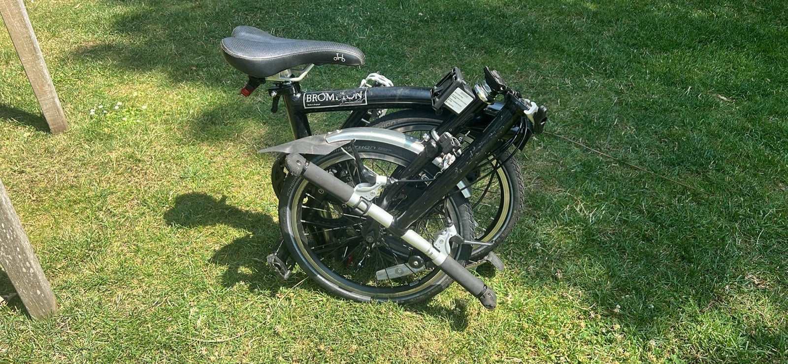 Brompton S2L Folding Bike black plus Brompton/Ortlieb blue front bag