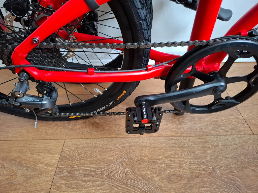 Carrera Intercity Disc 8-Speed Folding Bike With Accessories and more