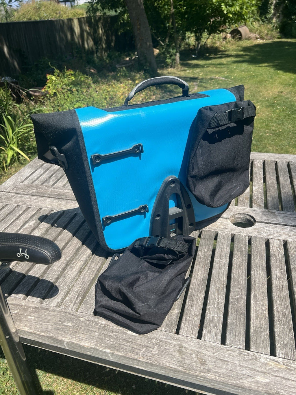 Brompton S2L Folding Bike black plus Brompton/Ortlieb blue front bag
