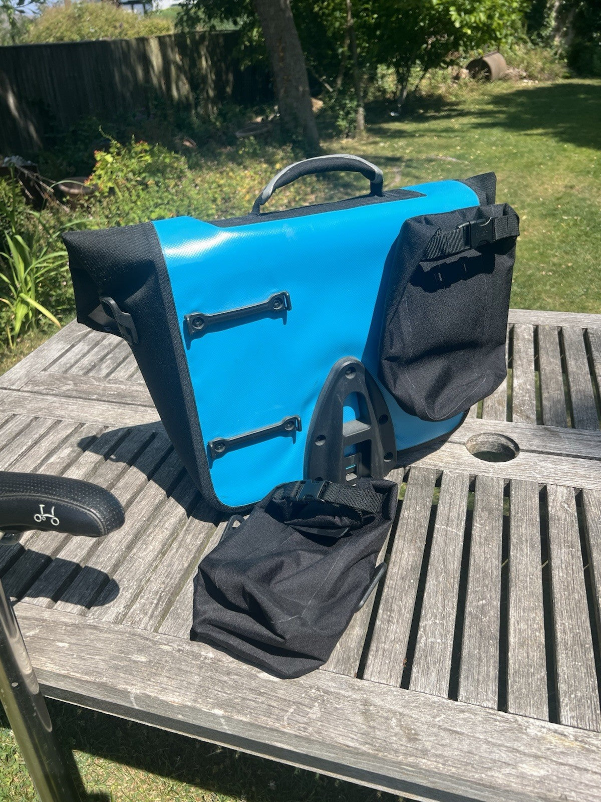 Brompton S2L Folding Bike black plus Brompton/Ortlieb blue front bag