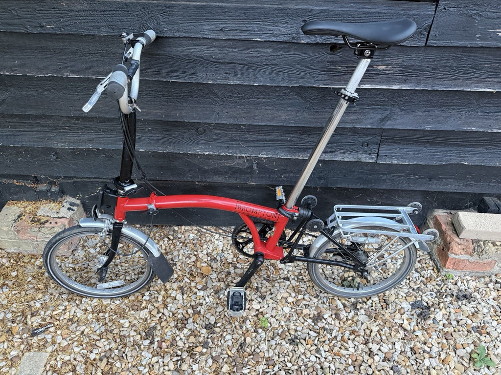 Brompton M3L Folding Bike Red complete with Rack And roll Along Wheels