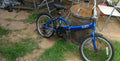 APOLLO TUCK FOLDING BIKE ADULTS IN BLUE NEEDS A LITTLE ATTENTION.