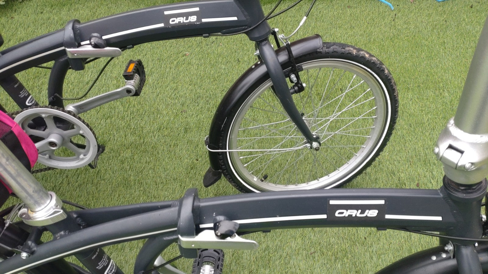 A Pair of Orus Folding Bikes with 20 Wheels Excellent Condition