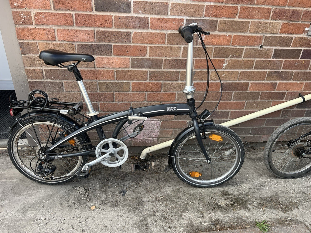 Oxylane 20in Folding Bike, single speed. And Ruck 7 speed