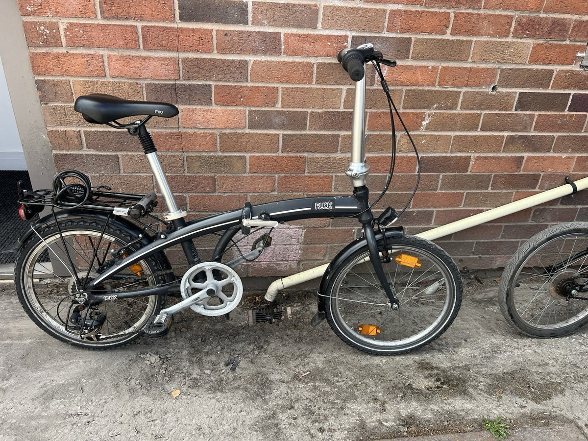 Oxylane 20in Folding Bike, single speed. And Ruck 7 speed