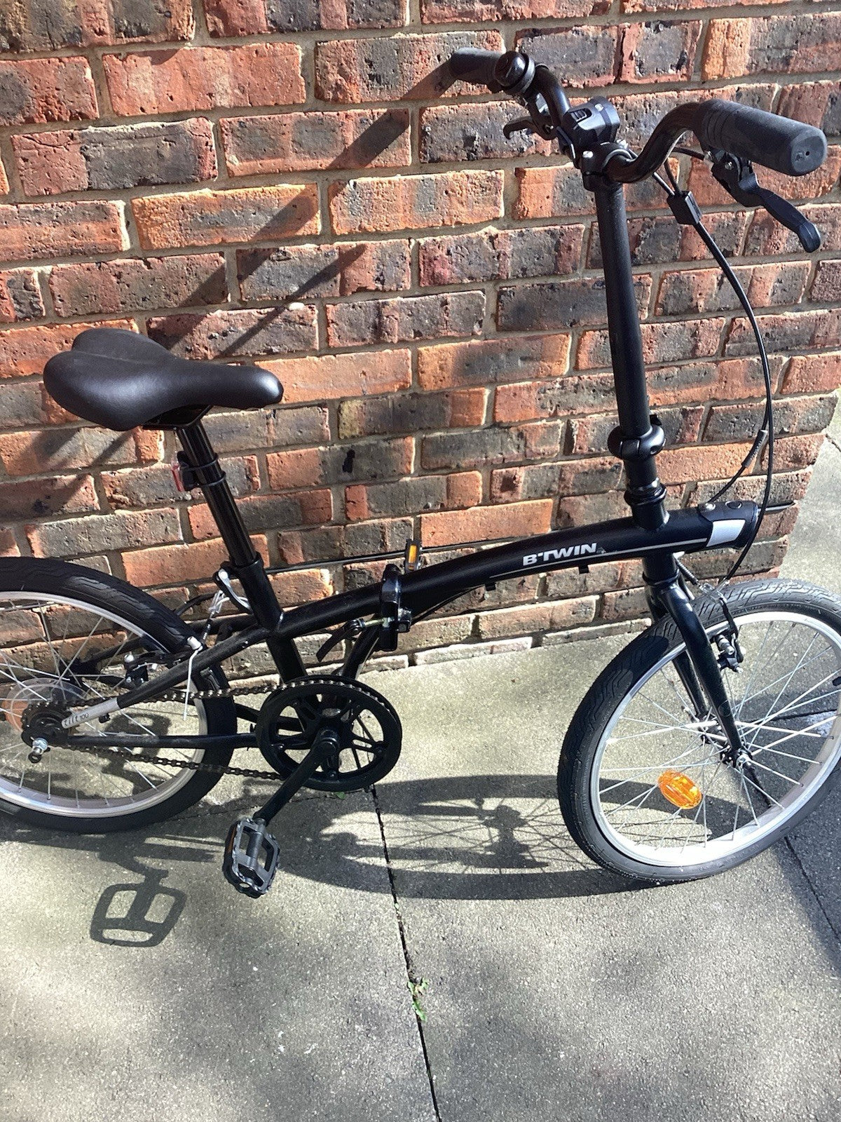 20 Inch folding bike Btwin 100 - Black,1 speed,bike stand included.Collection !