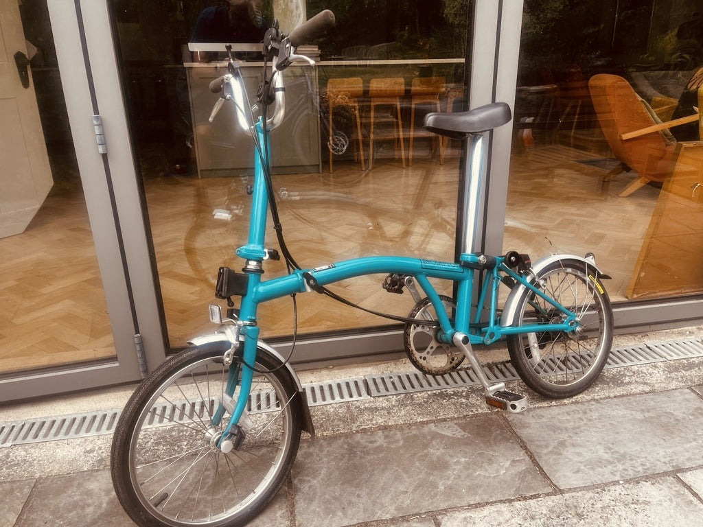 Brompton Folding Bike. Classic M3L model. 3 speed, lock and pump.