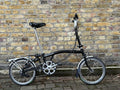 Brompton M6R Folding Bike 6-Speed - Black, w/ Mudguards and Rack - GC